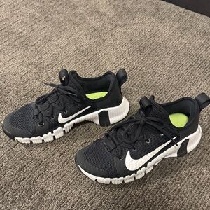 Nike women’s  Black and White Athletic Shoes